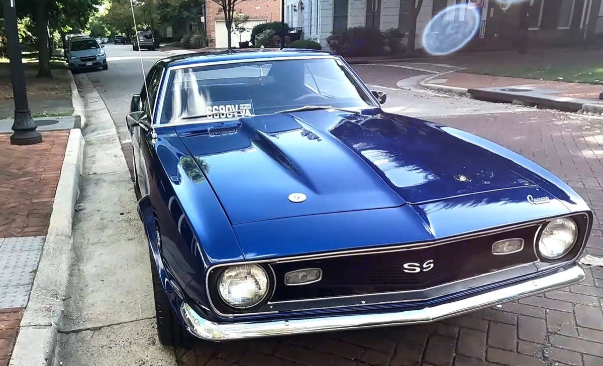 Deep blue classic Camaro SS after an exterior detail